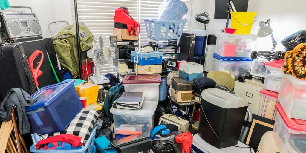 Cluttered room that is in need of a cleanout service by Big Phil's Rubbish Removal